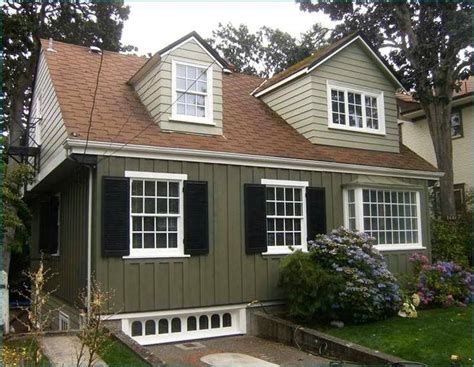 small brown house with metal roof|brown roof exterior color schemes.